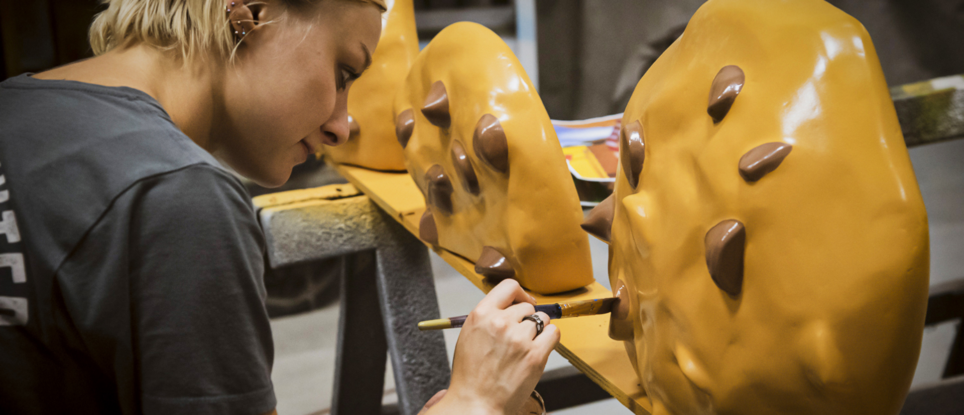 person painting a prop